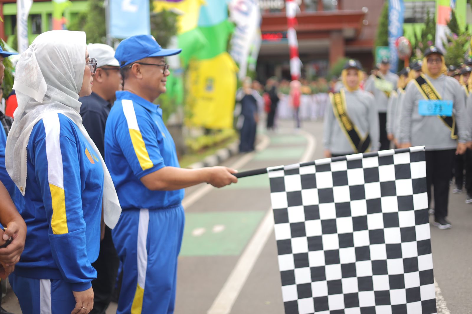 Pj. Wali Kota Bekasi Sambut Antusias Lomba Gerak Jalan Kolaborasi dengan Bank BJB